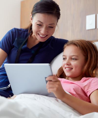 Nurse with pediatric patient